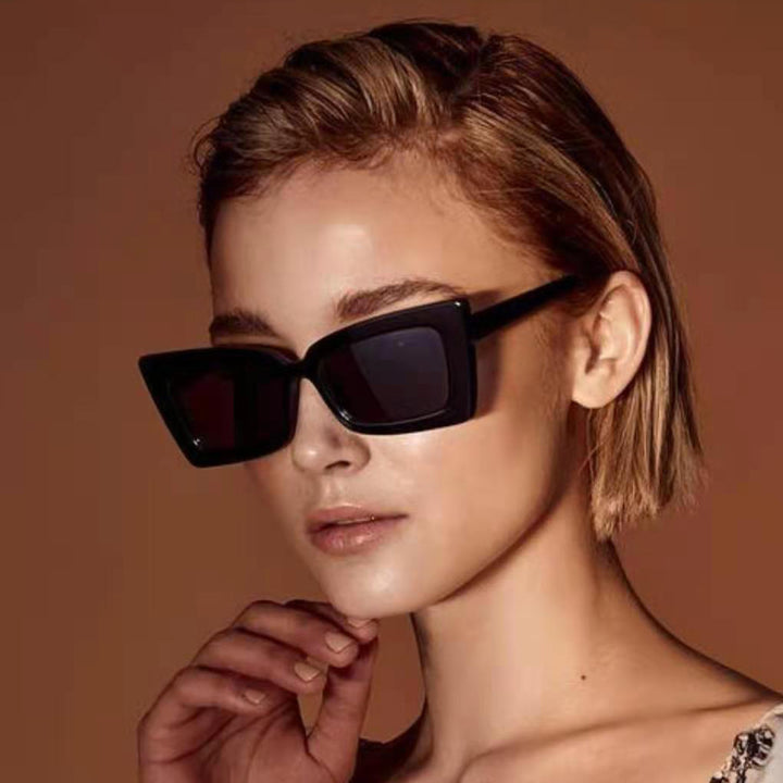 Women's stylish sunglasses with wide frame and distinctive design Stornfield