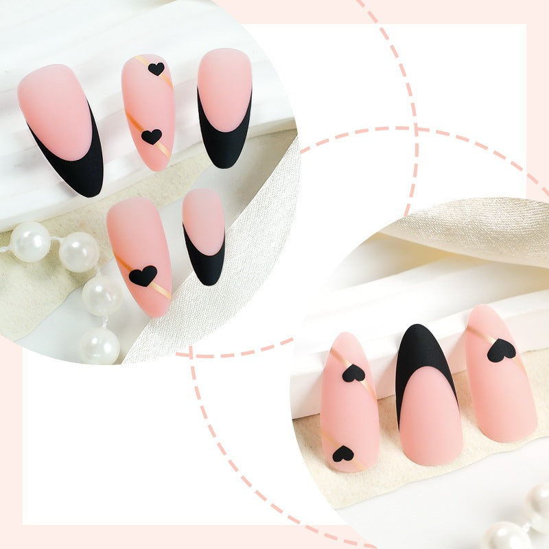 Creative nail art set with heart-shaped accents and elegant French tips Stornfield