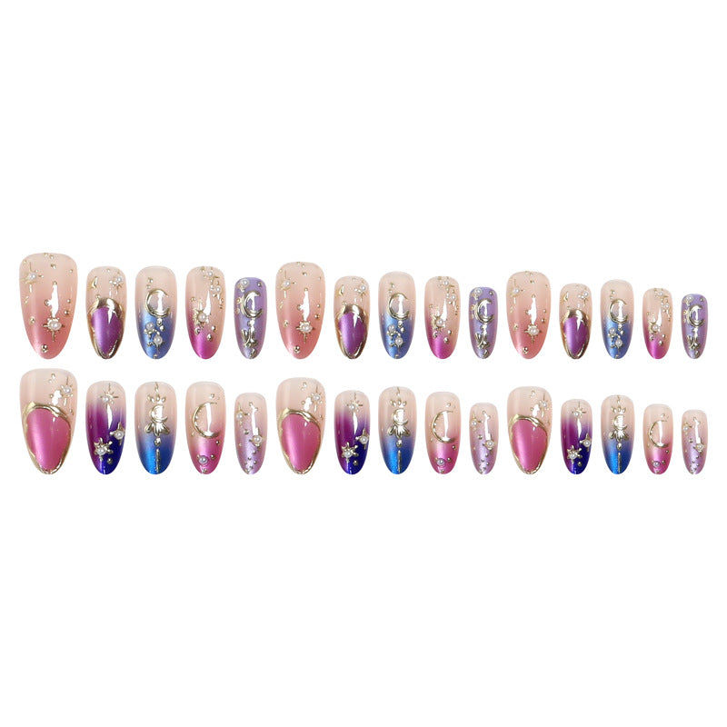Glamorous artificial nails with star and moon motifs Stornfield
