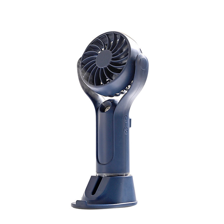 Unisex portable handheld fan with tiltable head, foldable stand and USB charging station Stornfield