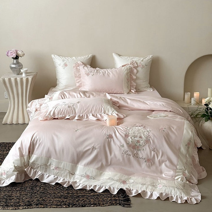 Delicate embroidered cotton satin bedding set with ruffle, satin trim, and rose motif