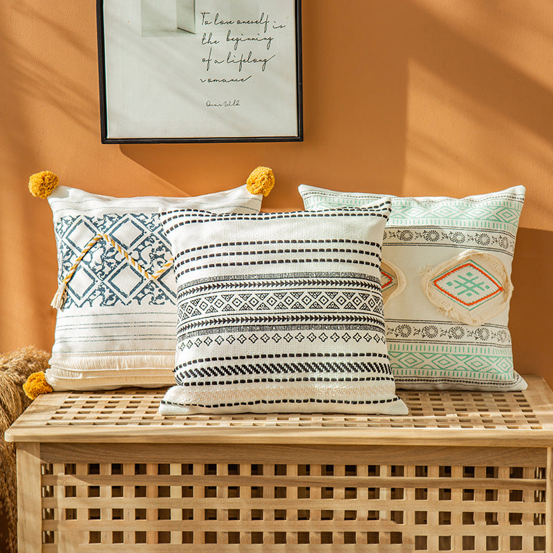 Square decorative pillow cover in Boho block print with braided tassels