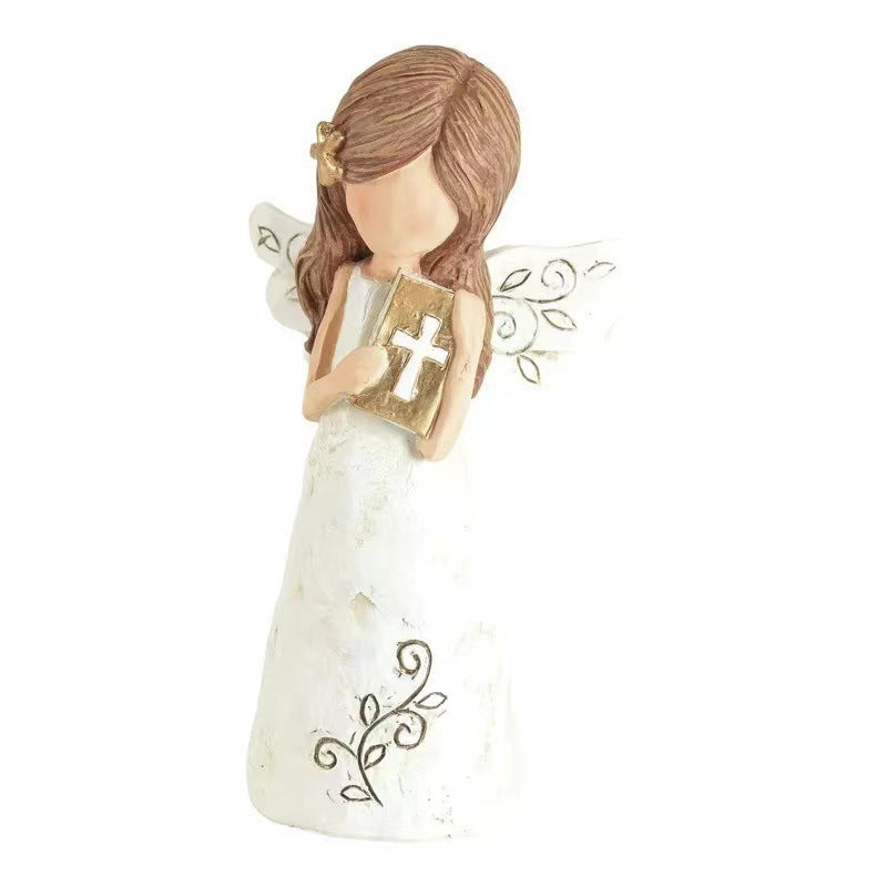 Women's Angel Figurine Holding Book