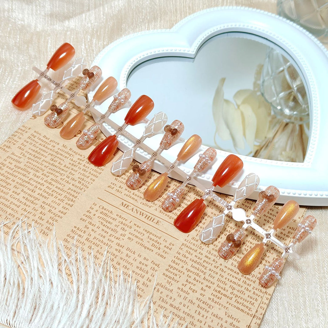 Artificial nails with elegant pearl decorations Stornfield