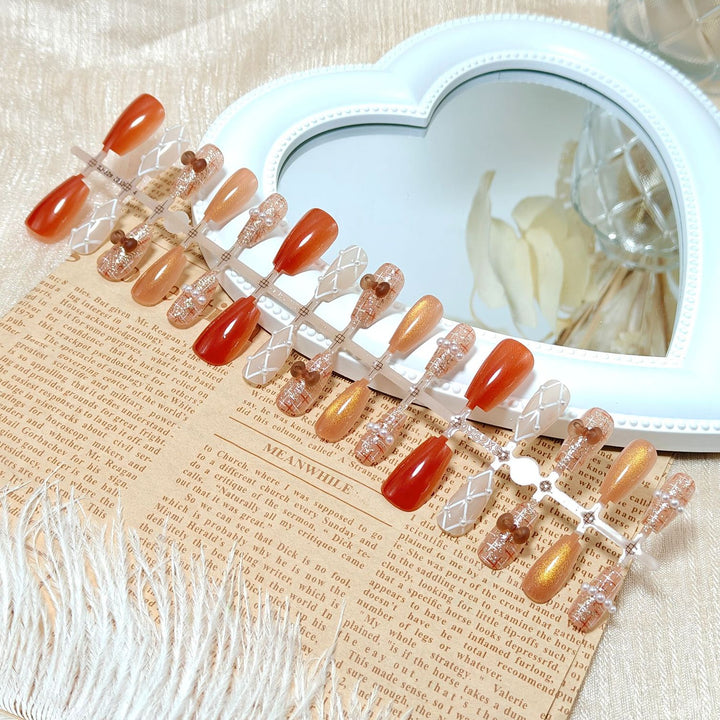 Artificial nails with elegant pearl decorations Stornfield