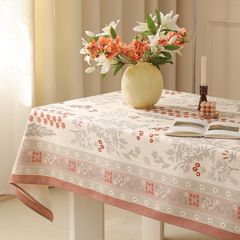 Rectangular easy-care tablecloth in floral jacquard with decorative border Stornfield