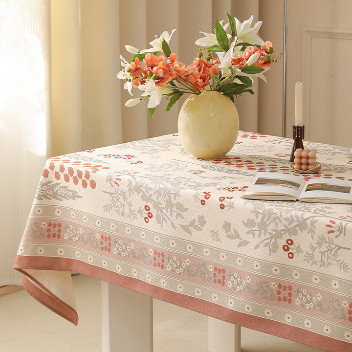 Rectangular easy-care tablecloth in floral jacquard with decorative border Stornfield