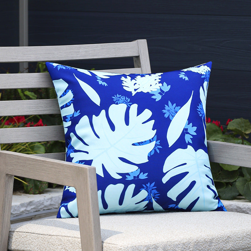 Square outdoor cushion cover made of water-repellent polyester with tropical Monstera print Stornfield