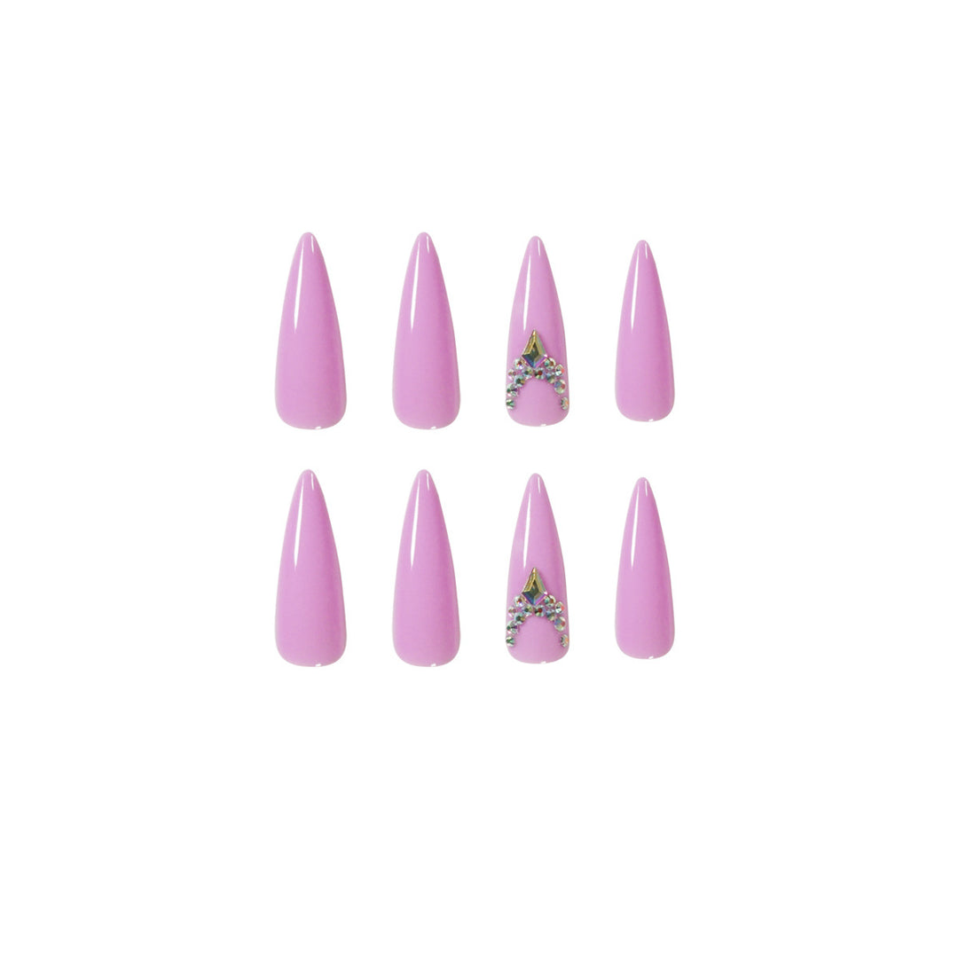 Glamorous stiletto nails with rhinestone decoration Stornfield