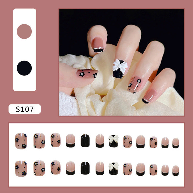 Artificial nail set with elegant bow and flower decoration Stornfield
