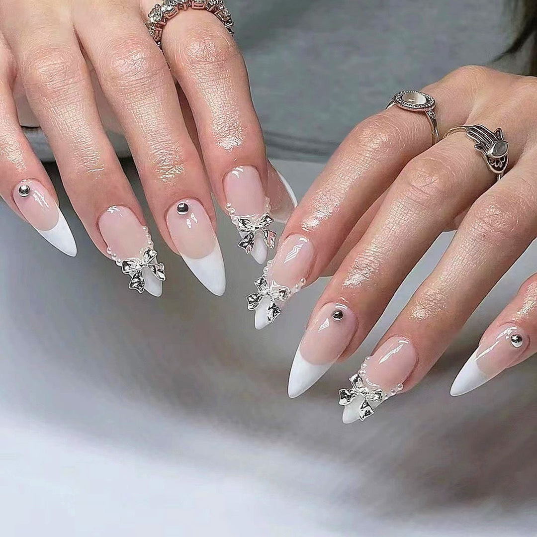 Glamorous artificial nail tips with elegant decorations Stornfield