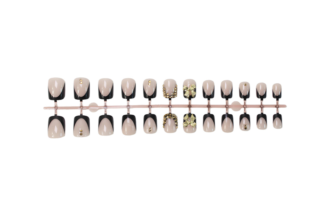 Artificial nail set with elegant black tips and sparkling accents Stornfield