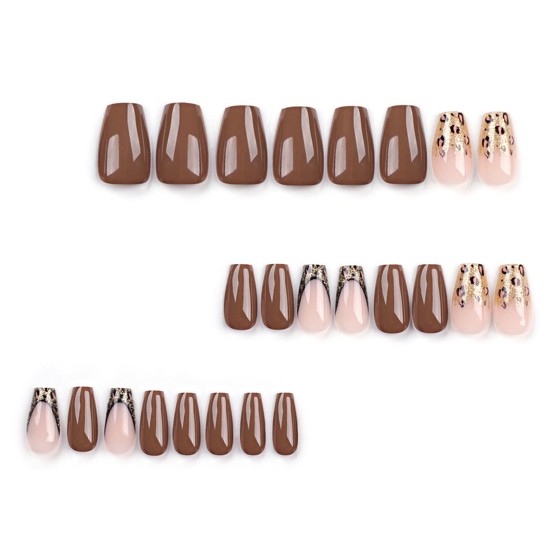 Glamorous acrylic nails with glitter and leopard designs Stornfield