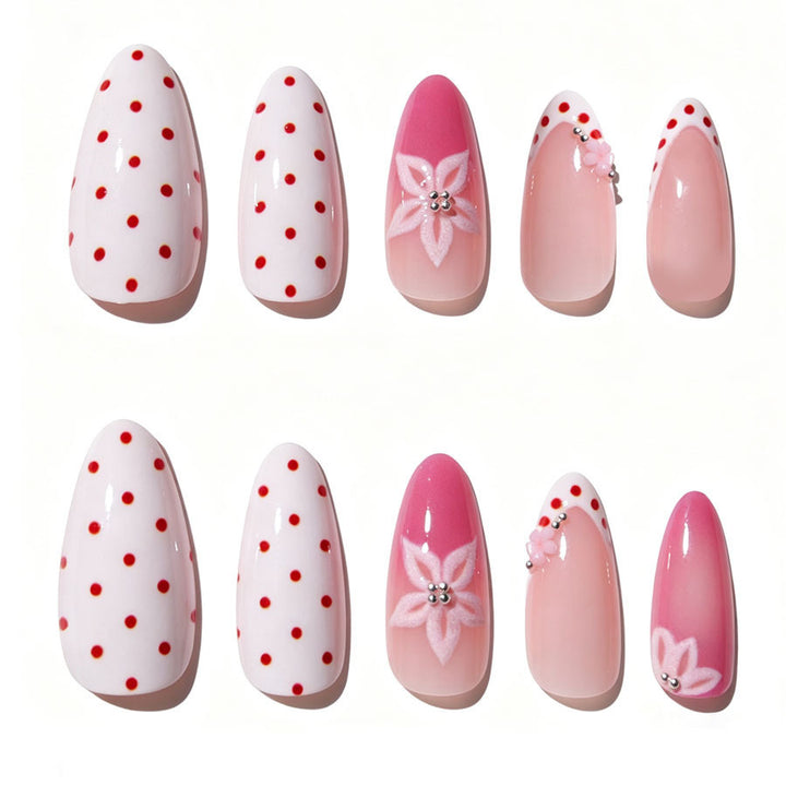 Artificial nail set with floral accents and charming polka dots Stornfield