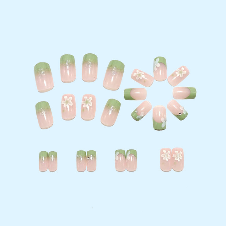 Artificial nails with floral accents and glitter coating Stornfield
