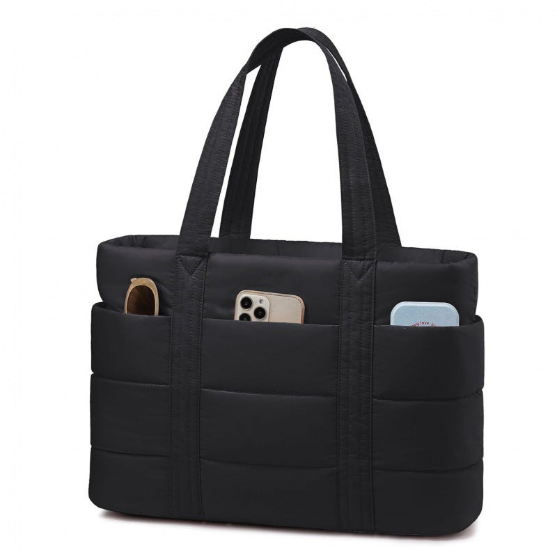 Padded everyday handbag with practical outer pockets Stornfield