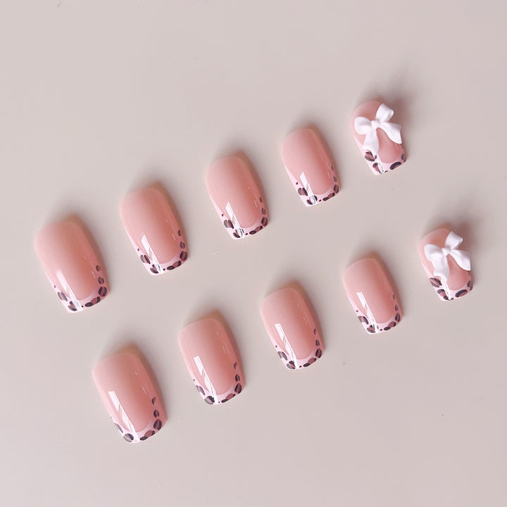 Artificial nails with leopard pattern and bows Stornfield