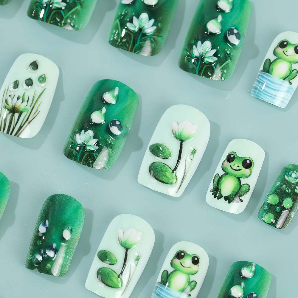 Creative art nails with frogs and plant details Stornfield