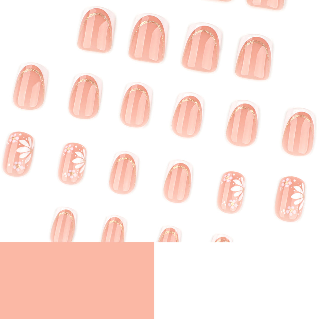 Artistic nail extensions with floral design and elegant accents Stornfield