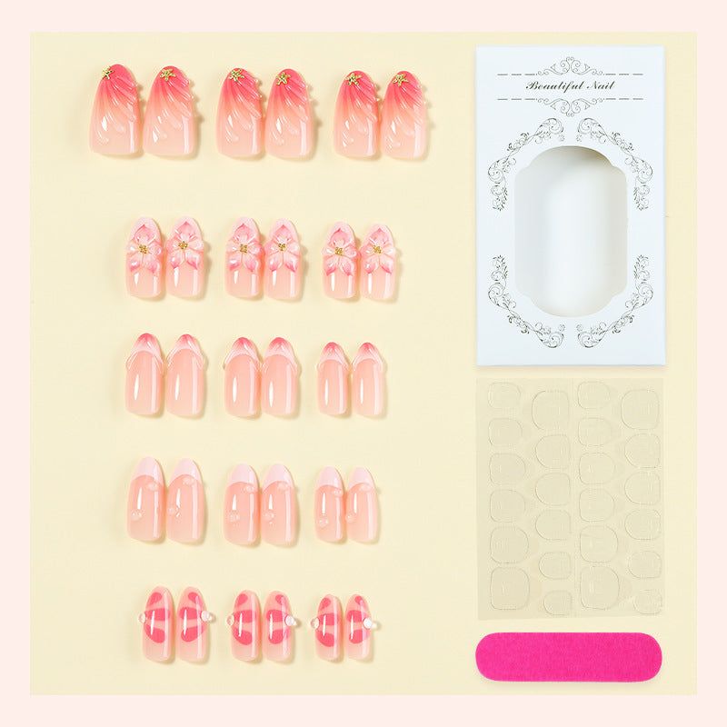 Artificial nail set with floral design and delicate gradient color Stornfield