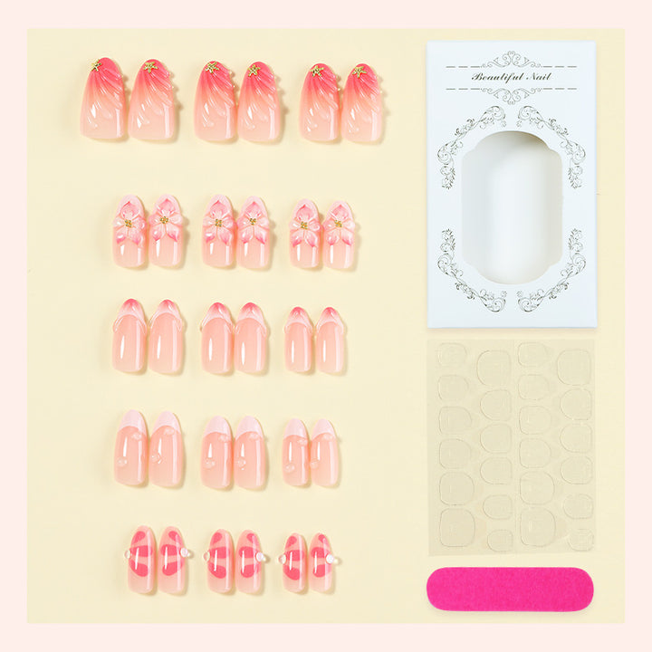 Artificial nail set with floral design and delicate gradient color Stornfield