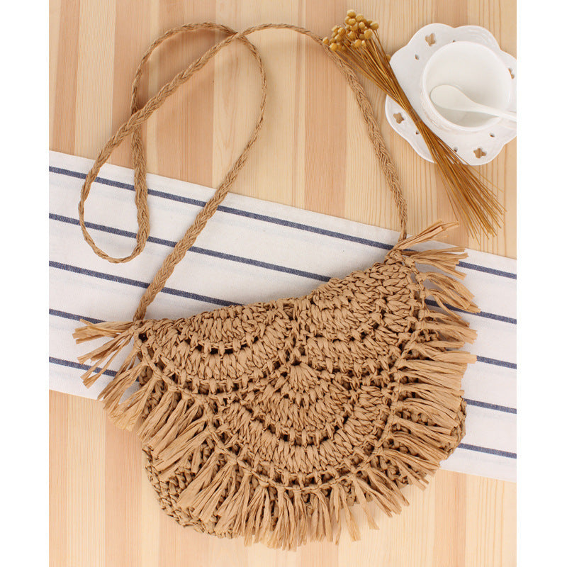 Handcrafted macrame shoulder bag with fringed design Stornfield