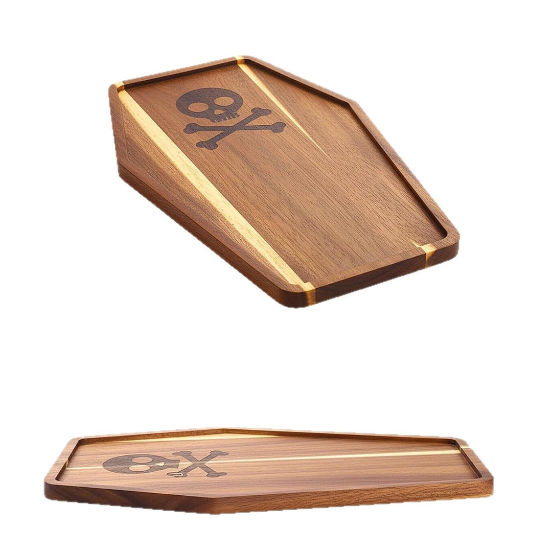 Skull-shaped cutting and serving board made of acacia wood with skull engraving