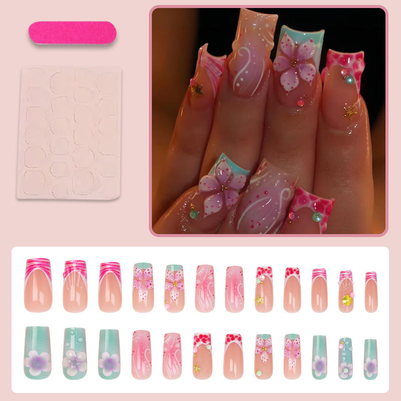 Nail set with floral accents and elegant details Stornfield