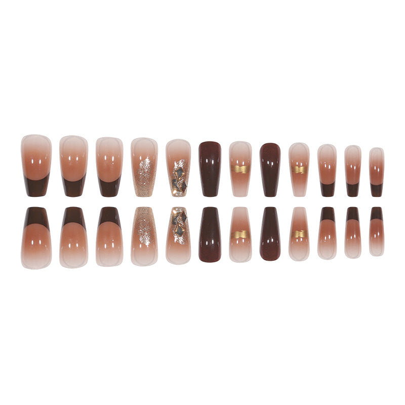 Elegant Long Press-On Nails with Decorative Gold Accents Stornfield