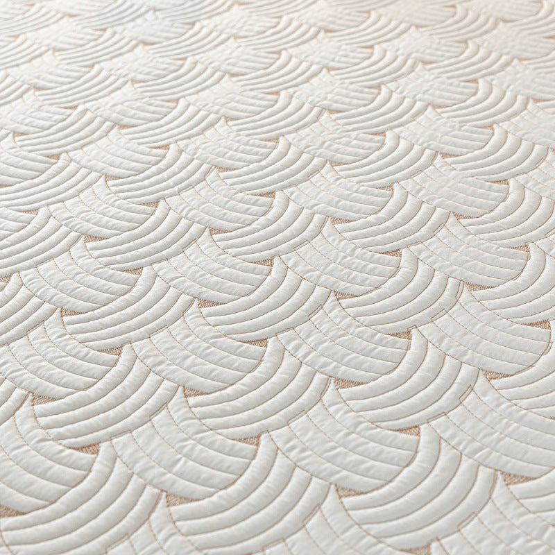 Quilted bedspread set with satin ruffle and geometric wave relief