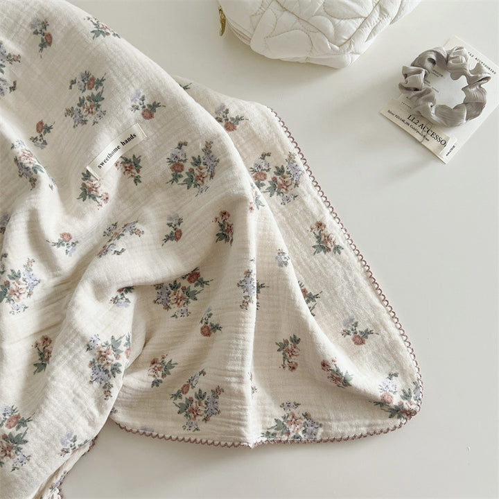 Unisex Muslin Blanket with delicate floral design and elegant ruffles Stornfield