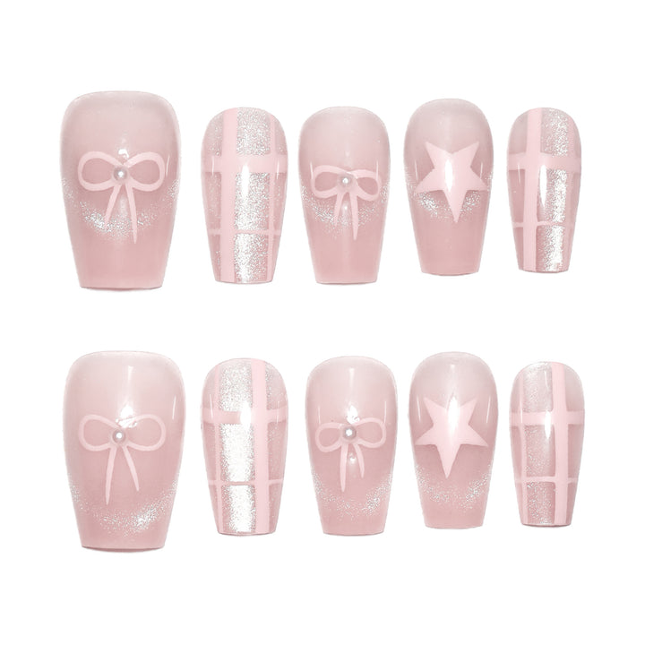 Artistic acrylic nails with elegant bow and star designs Stornfield
