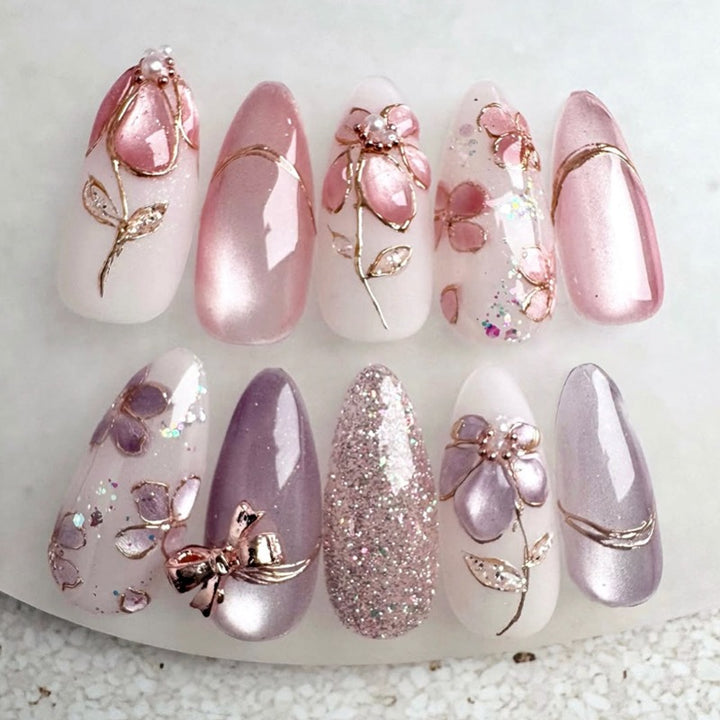 Artificial nail set with decorative flower and glitter embellishments Stornfield