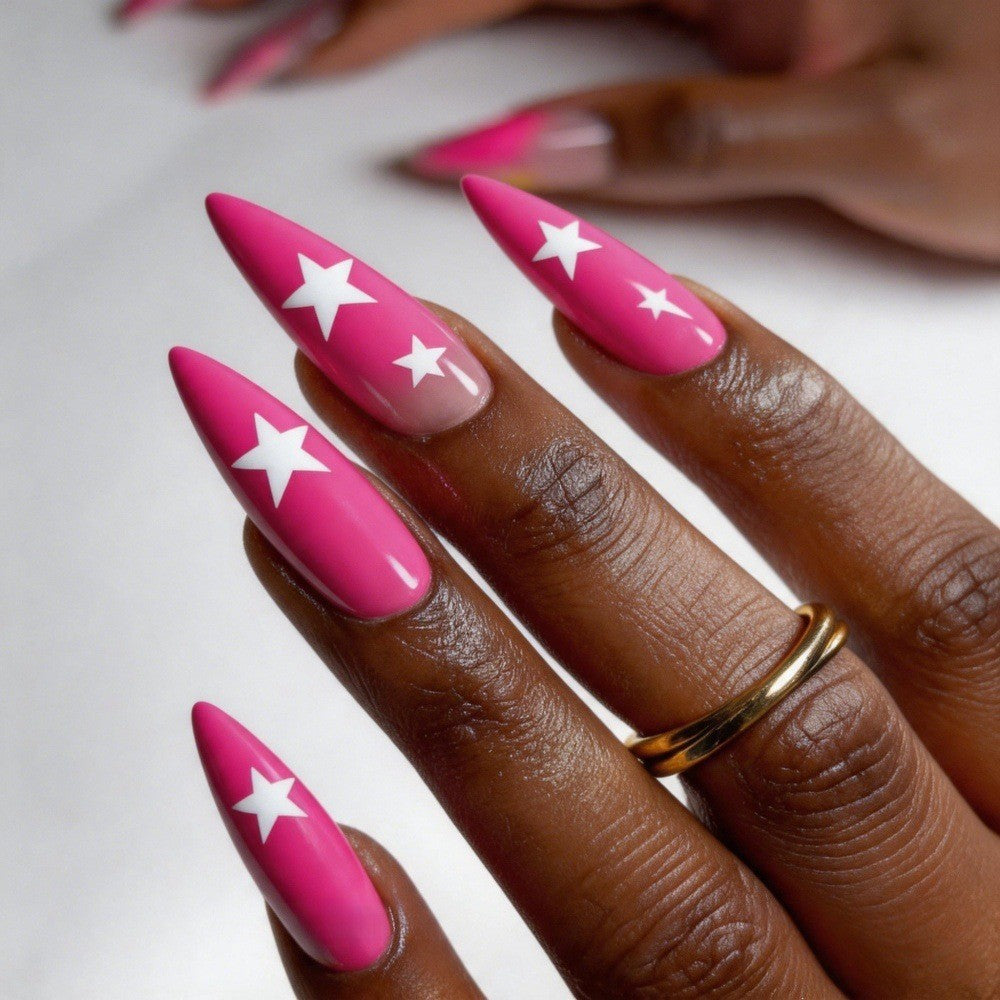 Artificial nails in elegant pointed design with star motifs Stornfield