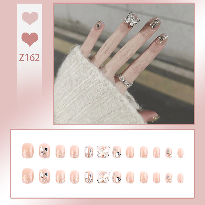 Nail art set with sparkling rhinestones and glitter elements Stornfield
