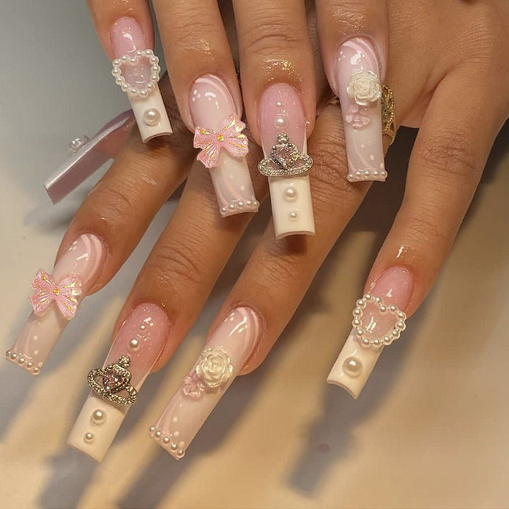 Creative acrylic nail set with delicate pearl and gloss accents Stornfield