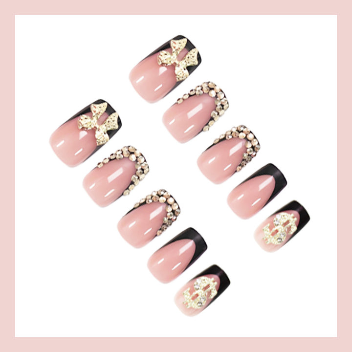 Artificial nail set with elegant golden decorations and modern design Stornfield