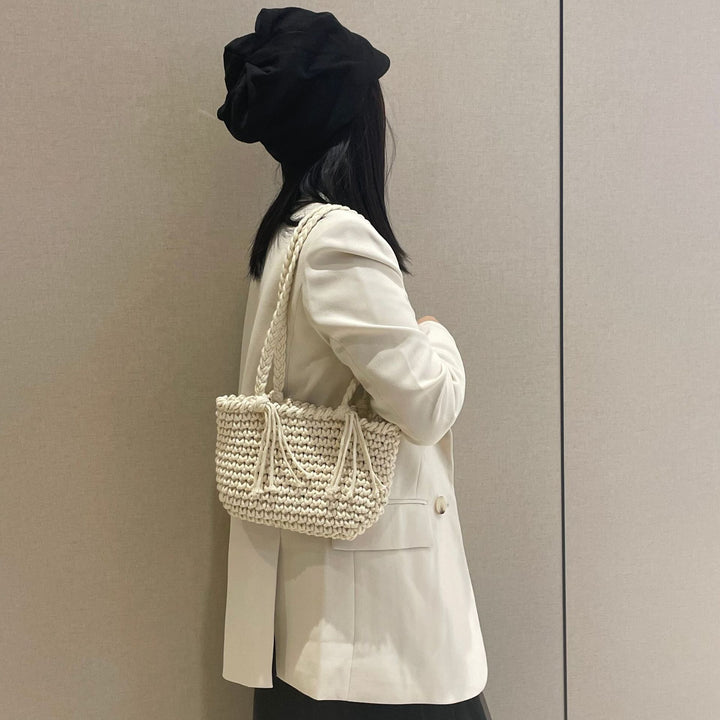 Hand-knotted shoulder bag with decorative pleating technique Stornfield