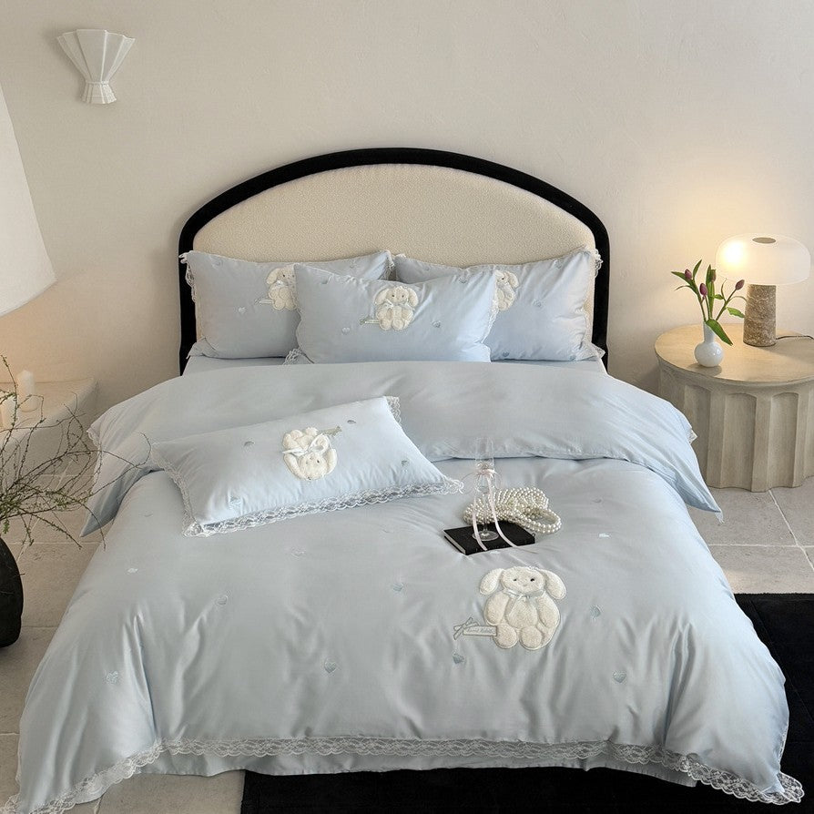 Luxurious bedding set made of cotton satin with embroidered plush bunny and lace trim