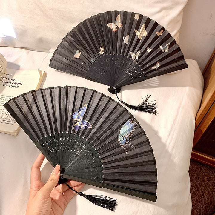 Handcrafted fan with elegant butterfly design Stornfield