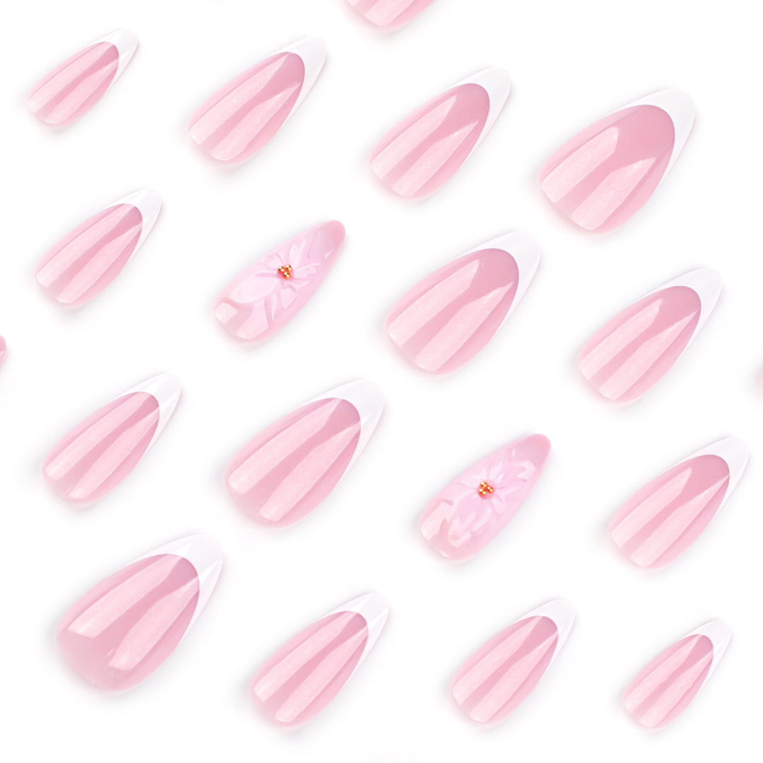 Artistic French-Tip Nail Extensions with Flower Accents Stornfield