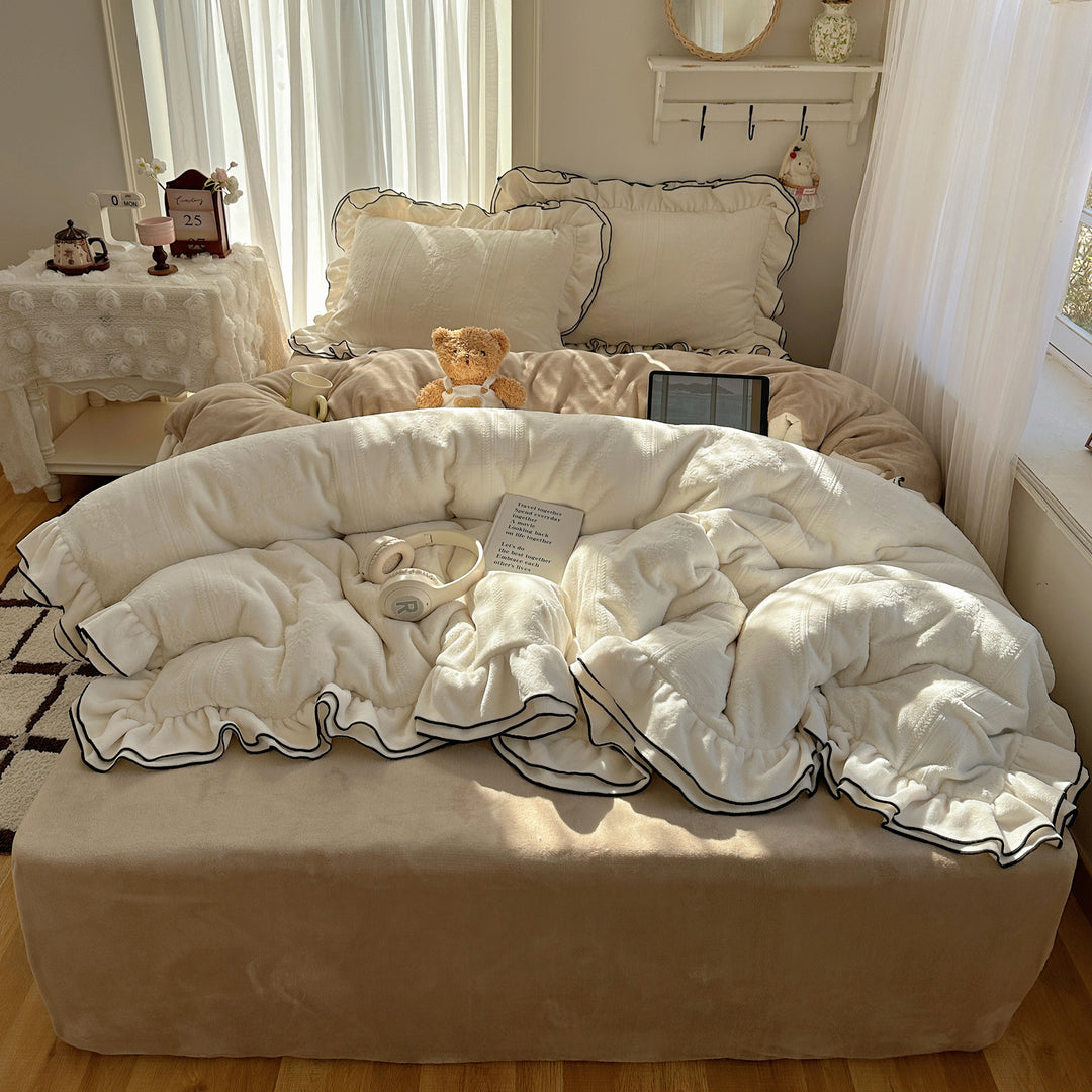 Cozy quilted bedding set with relief ribbon embroidery and contrasting ruffle edge