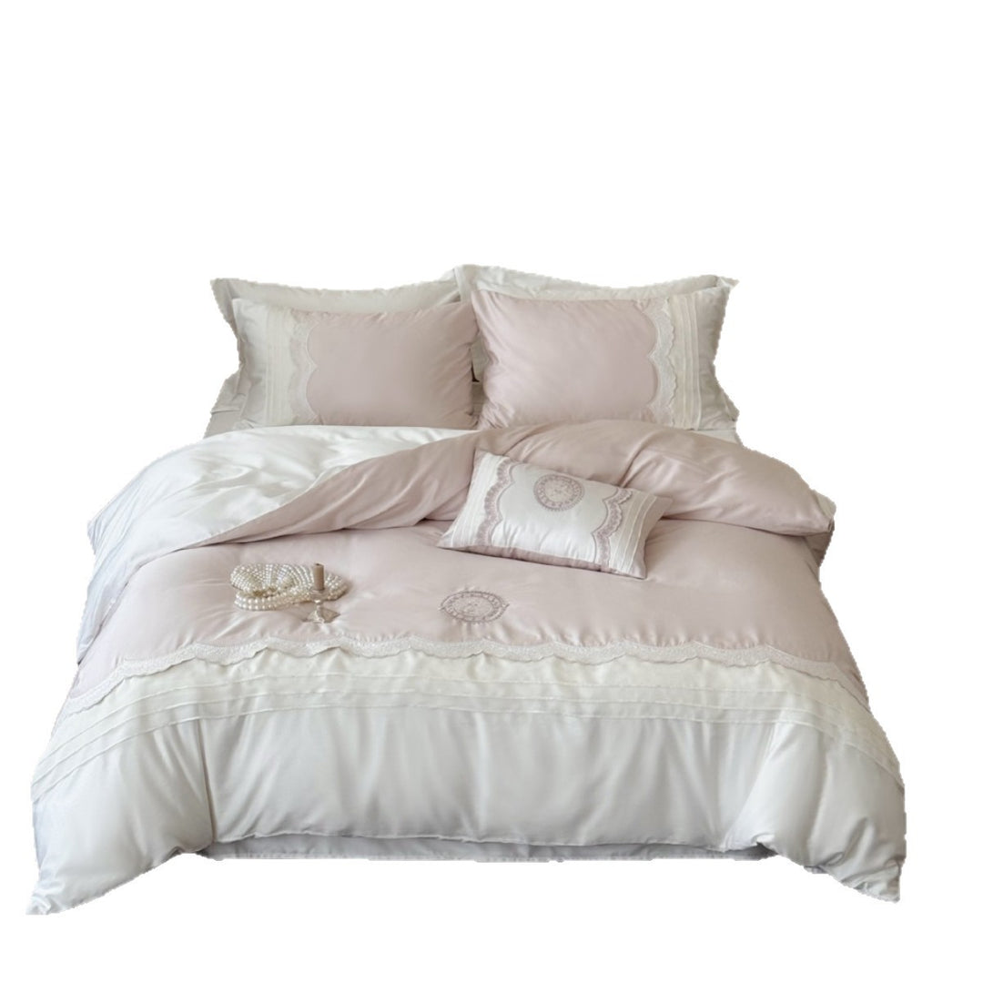High-quality bedding set made of cotton satin with fine lace trim and embroidered medallion decorative cushions