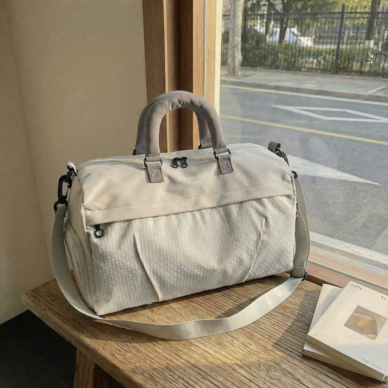 Sporty travel bag with padded carrying system and multiple compartments Stornfield