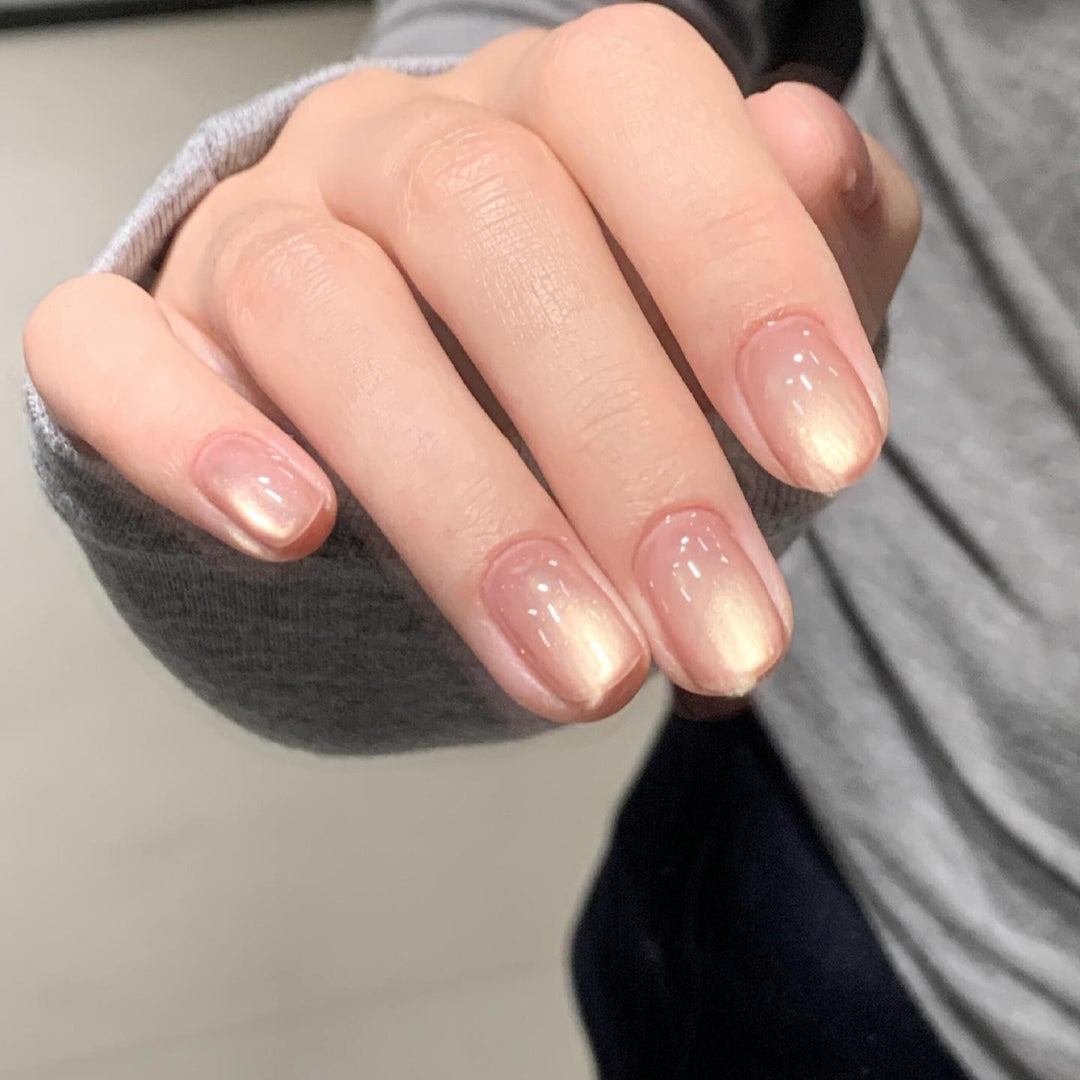 Shiny artificial nails with natural effect Stornfield