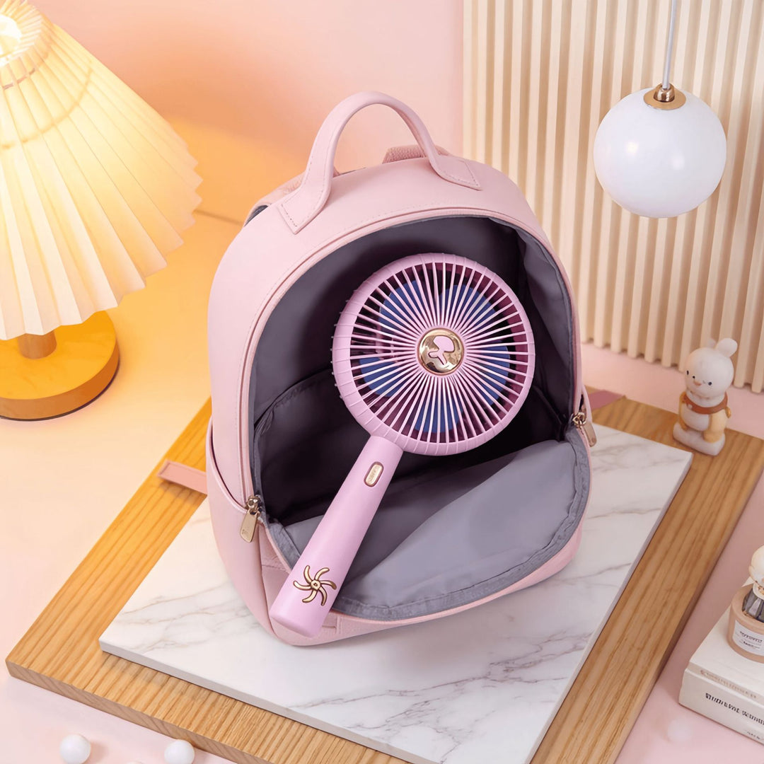 Cooling rechargeable handheld and tabletop fan with detachable base and USB charging Stornfield