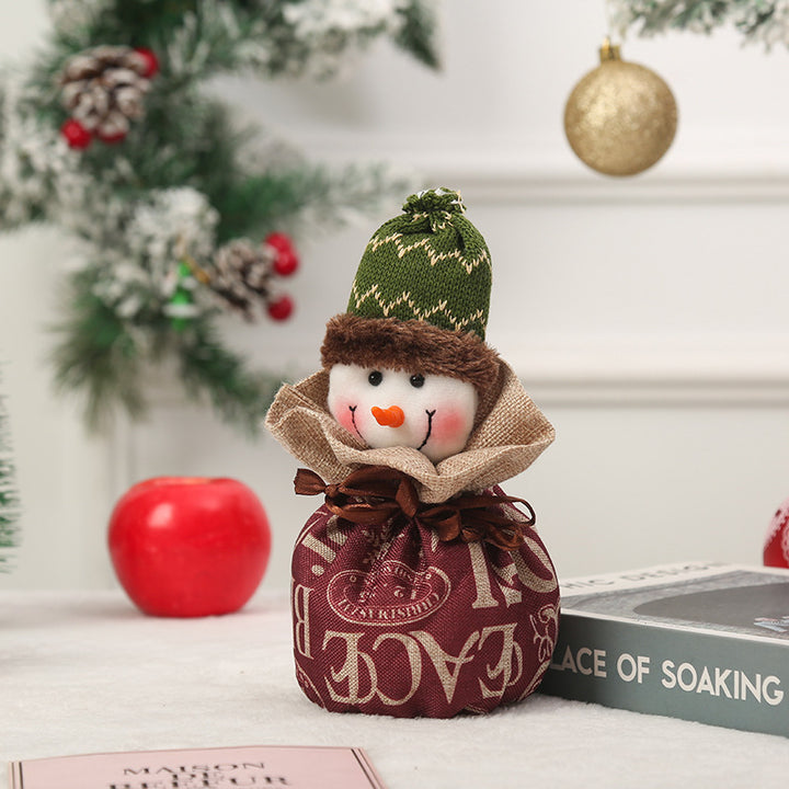 Cute Christmas gnome with gift sack Stornfield