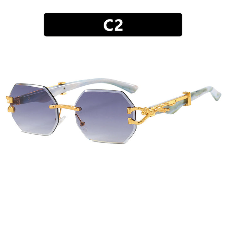Women's fashionable sunglasses with extravagant octagonal design and golden accents Stornfield