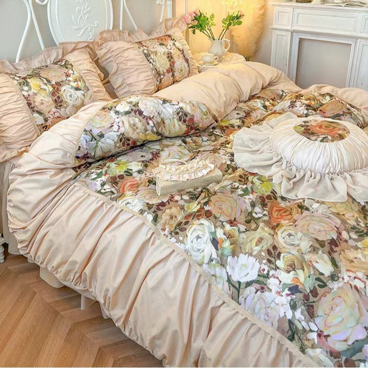 Romantic bedding set with ruffles, quilted bedspread and decorative cushion