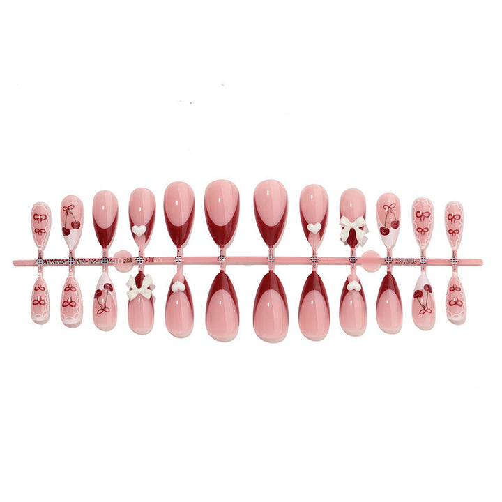 Fake nail set with playful motifs and elegant accents Stornfield